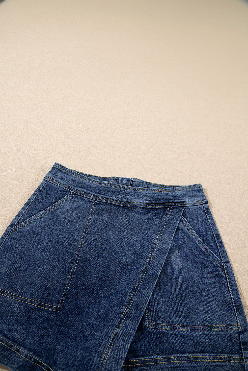 "Classic Denim mini skort side detail — flattering crossover wrap skirt Freedom Fulfillment"