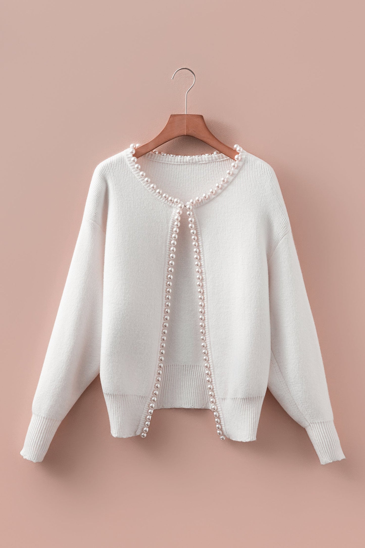 "Women's white pearl embellished cardigan styled — premium knitwear Freedom Fulfillment"