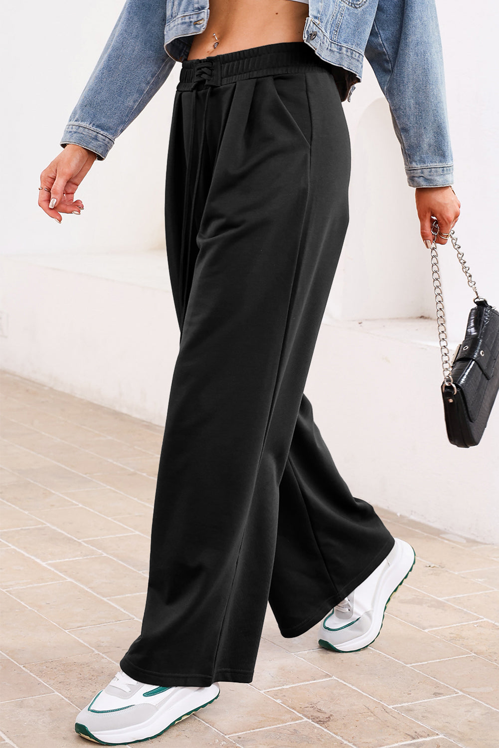 Solid High-Waist Pleated Sweatpants - Black - front view Women's premium pleated sweatpants